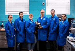 btg lab scientists smiling for group photo