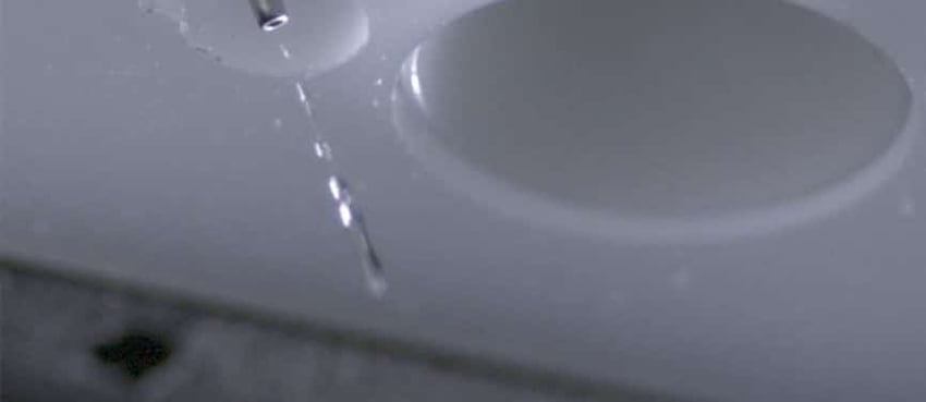 The Surface Analyst's Innovative Method of Depositing Water to Measure Contact Angle: Ballistic Deposition