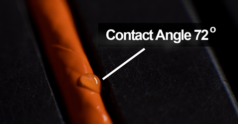 orange-wire-curved-surface-water-drop-contact-angle-72-degrees-IG