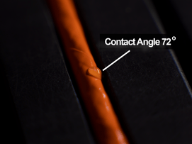 orange-wire-curved-surface-water-drop-contact-angle-72-degrees