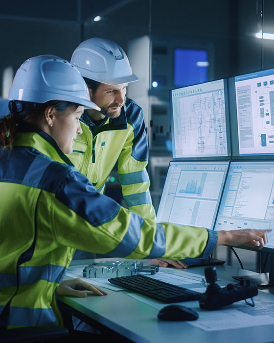 production-line-engineers-reviewing-data
