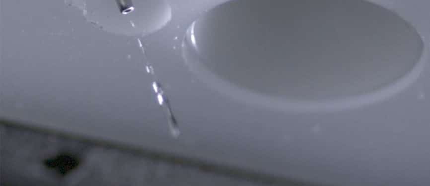 The Surface Analyst's Innovative Method of Depositing Water to Measure Contact Angle: Ballistic Deposition